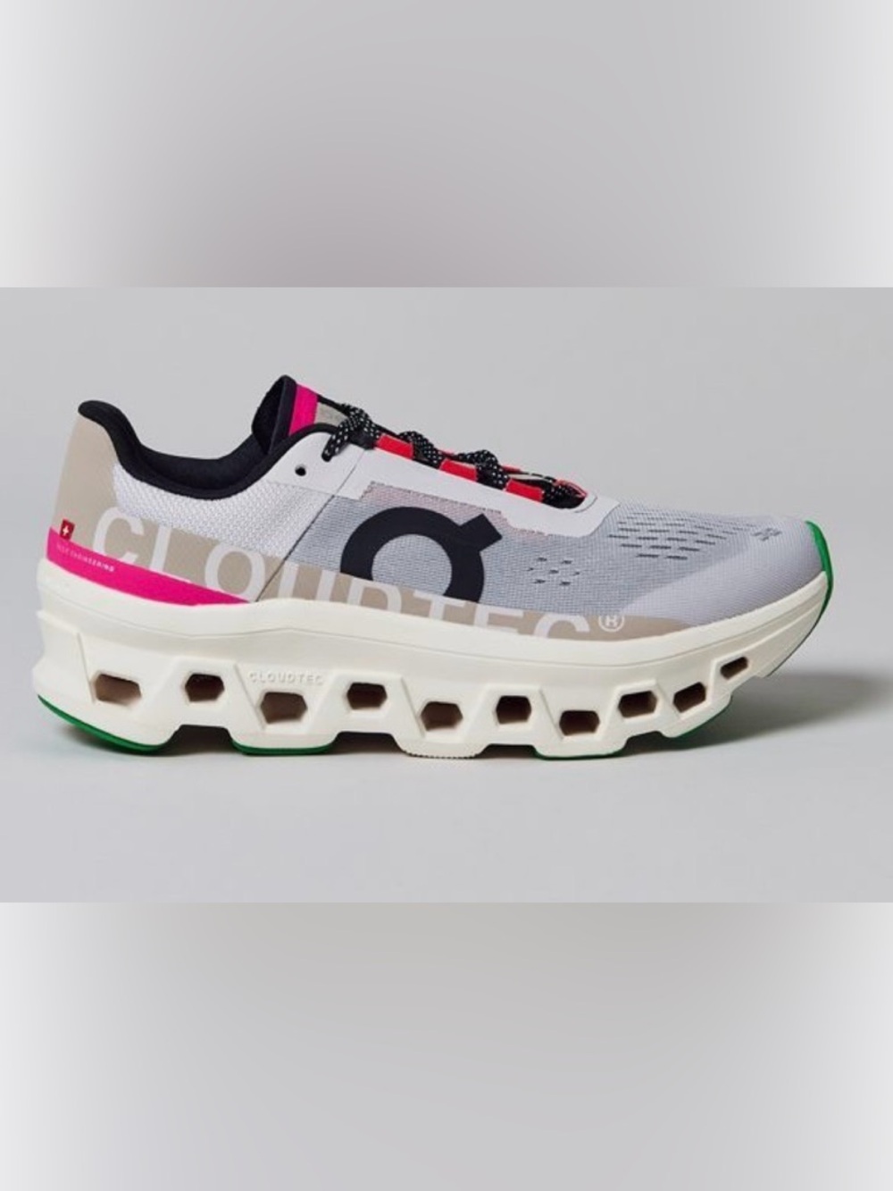 On Running Black and White Running Sneaker with Red Accents